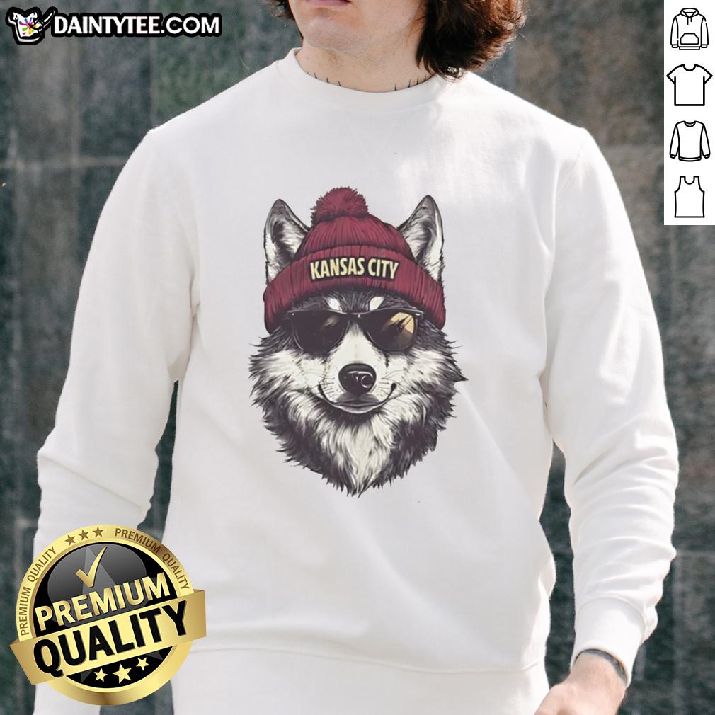 Alt Text: Kansas City Chiefs mascot in beanie and sunglasses wearing a sweatshirt, showcasing team spirit and fun.