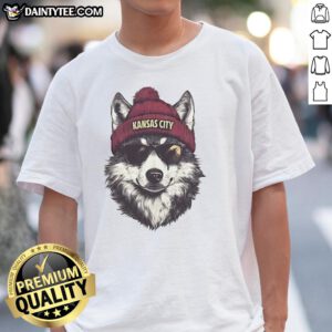 Alt Text: Kansas City Chiefs mascot wearing a beanie and sunglasses on a fun T-shirt, showcasing team spirit and style.