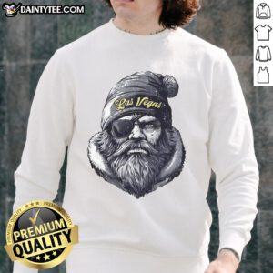 Awesome Las Vegas Raiders mascot in a beanie and sunglasses, wearing a sweatshirt, showcasing team spirit.
