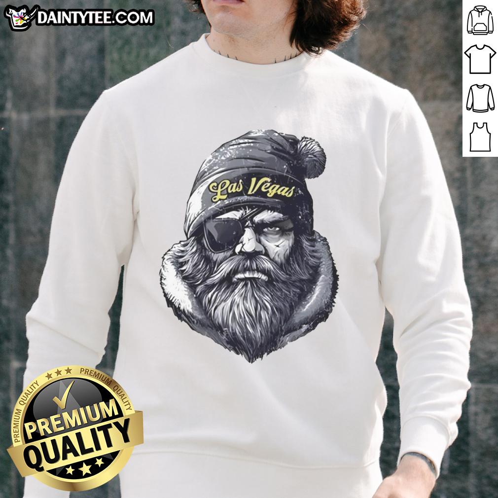 Awesome Las Vegas Raiders mascot in a beanie and sunglasses, wearing a sweatshirt, showcasing team spirit.