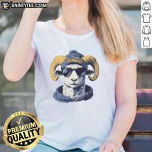 Alt Text: Los Angeles Rams mascot in a beanie and sunglasses, showcasing an awesome ladies tee for football fans.