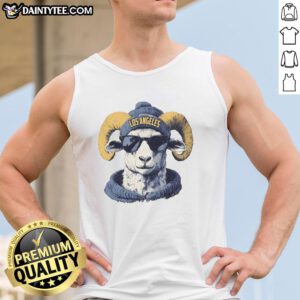 Alt Text: Los Angeles Rams mascot in a beanie and sunglasses, wearing a tank top, showcasing team spirit and fun.