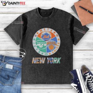 Awesome New York Mets, Jets, and Knicks mashup logo on a washed t-shirt, perfect for sports fans.
