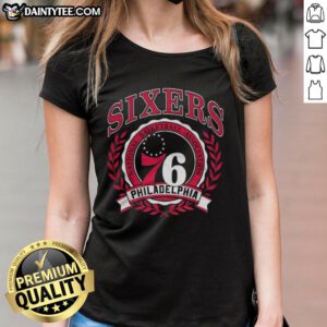 Retro Philadelphia 76ers logo in a laurel wreath frame on a ladies tee, perfect for NBA fans.
