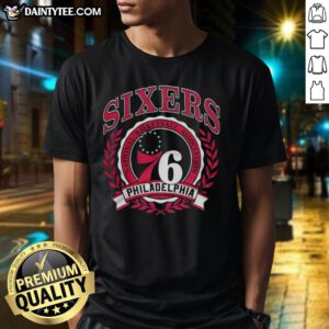 Alt Text: Retro Philadelphia 76ers NBA logo t-shirt with a laurel wreath frame, perfect for basketball fans and collectors.
