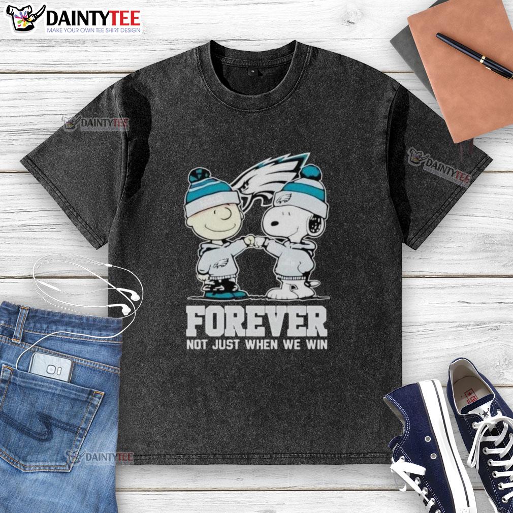 Awesome Philadelphia Eagles Charlie Brown and Snoopy Forever graphic on a washed t-shirt, perfect for fans and casual wear.