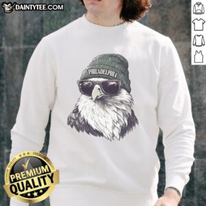 Alt Text: Awesome Philadelphia Eagles mascot in a beanie and sunglasses, sporting a stylish sweatshirt, ready for game day.