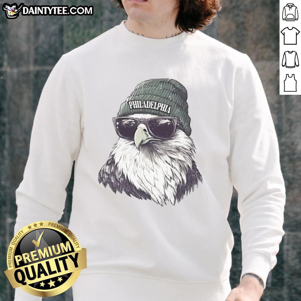 Alt Text: Awesome Philadelphia Eagles mascot in a beanie and sunglasses, sporting a stylish sweatshirt, ready for game day.