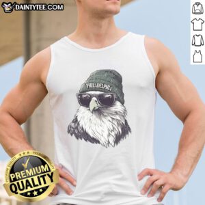 Philadelphia Eagles mascot wearing a beanie and sunglasses, showcasing team spirit in a stylish tank top.