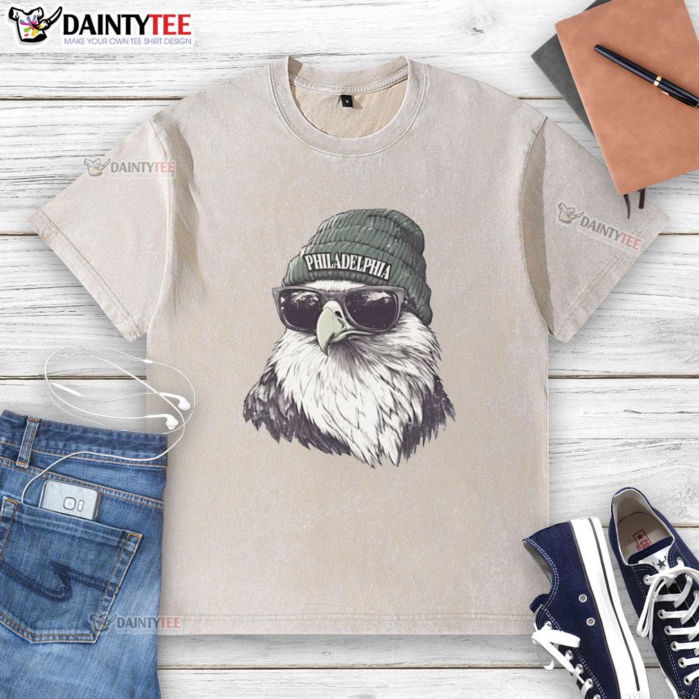 Philadelphia Eagles mascot in a beanie and sunglasses, showcasing an awesome washed t-shirt style at a game.