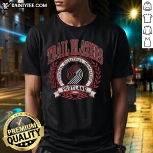 Alt Text: Retro Portland Trail Blazers NBA logo T-shirt featuring a laurel wreath frame design for fans and collectors.