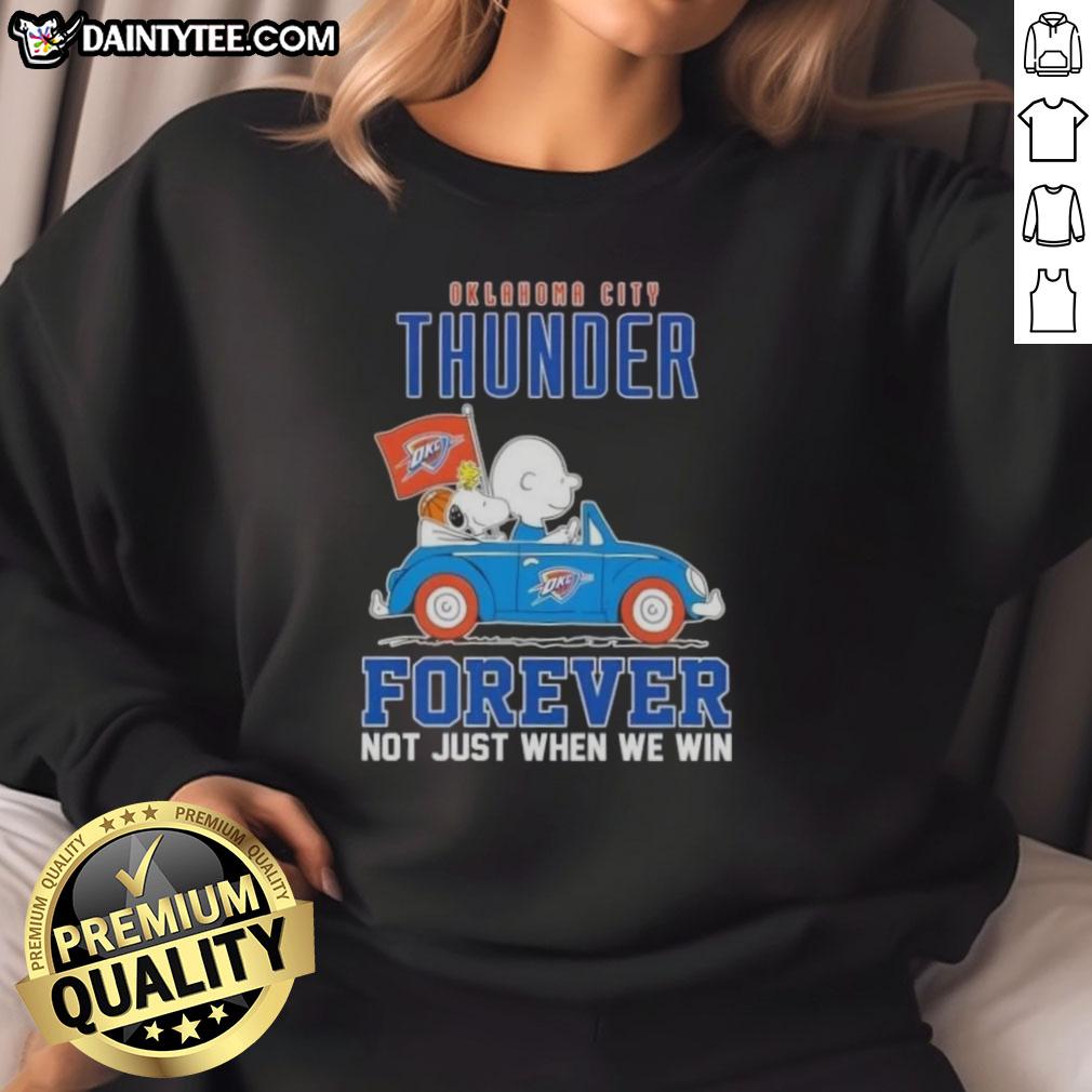 Awesome Snoopy and Charlie Brown driving a car in Oklahoma City Thunder sweatshirt, celebrating fandom and sports spirit.