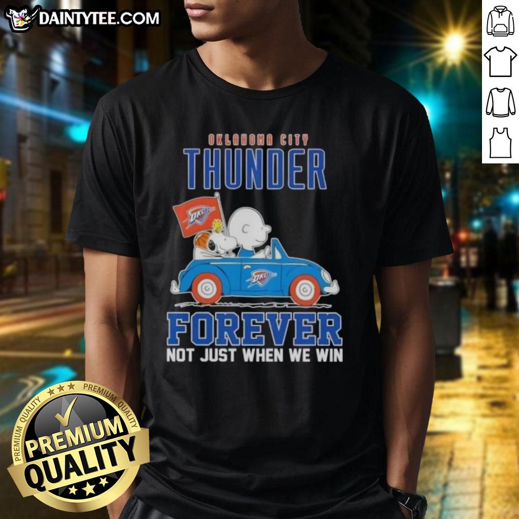 Alt Text: Snoopy and Charlie Brown driving a car on an Oklahoma City Thunder T-shirt, celebrating team spirit and loyalty.