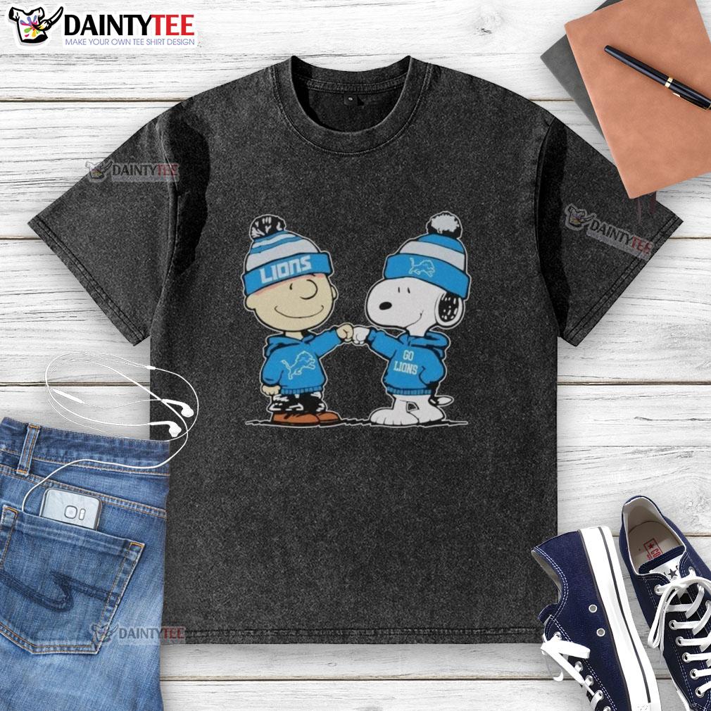Cute Detroit Lions Snoopy and Charlie Brown best friends graphic on a washed t-shirt, perfect for fans.
