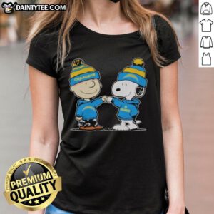 Cute Los Angeles Chargers Snoopy and Charlie Brown best friends graphic on a ladies tee shirt.