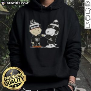 Alt Text: Cute Peanuts Charlie Brown and Snoopy fist bump in Las Vegas Raiders football hoodie, perfect for fans and collectors.