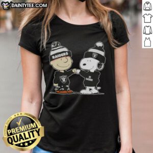 Alt Text: Cute Peanuts Charlie Brown and Snoopy fist bump in Las Vegas Raiders football ladies tee design.