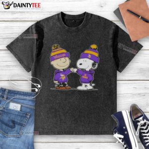 Alt Text: Cute Peanuts Charlie Brown and Snoopy fist bump in Minnesota Vikings football washed t-shirt design.