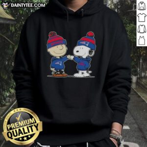 Alt Text: Charlie Brown and Snoopy fist bump in a New England Patriots football hoodie, celebrating team spirit and friendship.