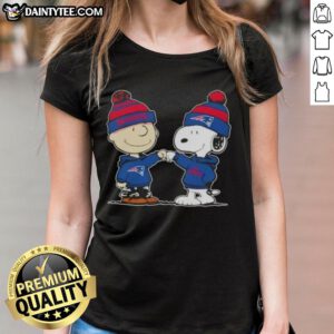 Alt Text: Cute Peanuts Charlie Brown and Snoopy fist bump in New England Patriots football tee for ladies.