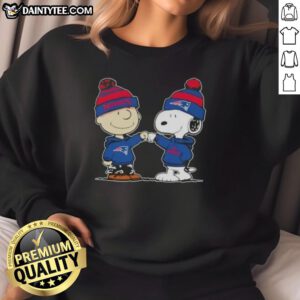 Alt Text: Cute Peanuts Charlie Brown fist bump with Snoopy in New England Patriots football sweatshirt design.