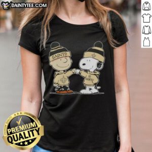 Alt Text: Cute Peanuts Charlie Brown and Snoopy fist bump in New Orleans Saints football ladies tee design.