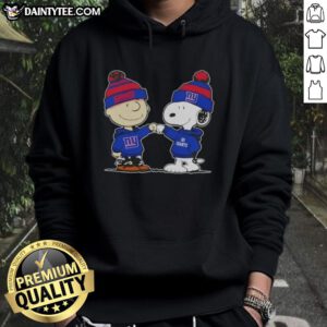 Cute Peanuts Charlie Brown and Snoopy fist bump in New York Giants football hoodie, perfect for fans and collectors.