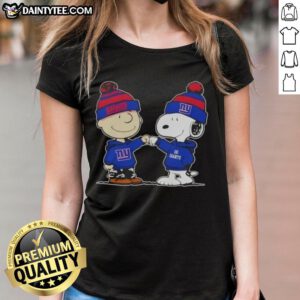 Cute Peanuts Charlie Brown and Snoopy fist bump in New York Giants football ladies tee design.
