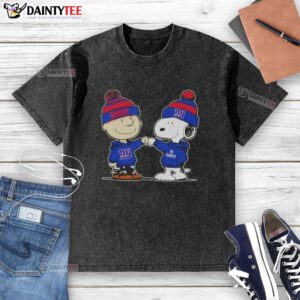 Alt Text: Cute Peanuts Charlie Brown and Snoopy fist bump in New York Giants football washed t-shirt design.