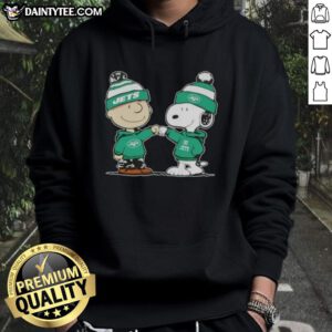 Cute Peanuts Charlie Brown and Snoopy fist bump in New York Jets football hoodie, showcasing team spirit and friendship.