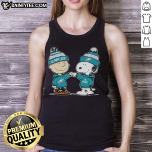 Cute Peanuts Charlie Brown fist bumping Snoopy in Philadelphia Eagles football tank top, perfect for fans.