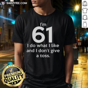 Funny I'M 61 I Do What I Like And I Don'T Give A Toss Letter T-Shirt design featuring bold text and vibrant colors.