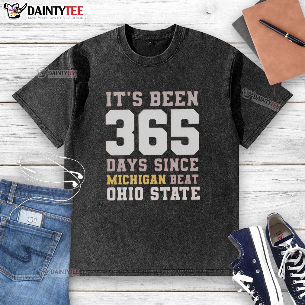 Funny 'It's Been 365 Days Since Michigan Beat Ohio State' washed t-shirt, perfect for college football fans and rivalry supporters.