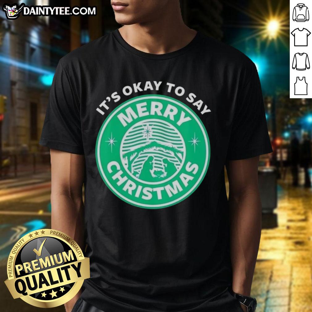Alt Text: Funny It's Okay To Say Merry Christmas logo T-Shirt featuring festive graphics and a playful holiday message.