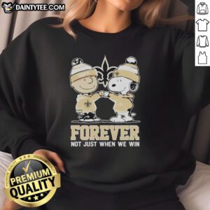 Funny New Orleans Saints X Charlie Brown vs Snoopy sweatshirt featuring playful graphics celebrating team spirit.