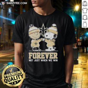 Alt Text: Funny New Orleans Saints X Charlie Brown T-Shirt featuring Snoopy, perfect for fans celebrating every game, win or lose.