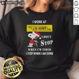 Funny Snoopy sweatshirt featuring 'I work at J.B. Hunt, I don't stop when I'm tired, I stop when I'm done' design.