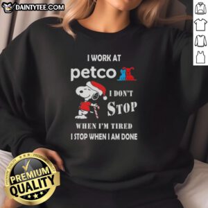 Funny Snoopy sweatshirt for Petco employees, featuring a humorous quote about hard work and holiday spirit.