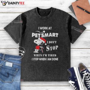 Funny Snoopy Christmas t-shirt design featuring the phrase about working at PetSmart, perfect for pet lovers.