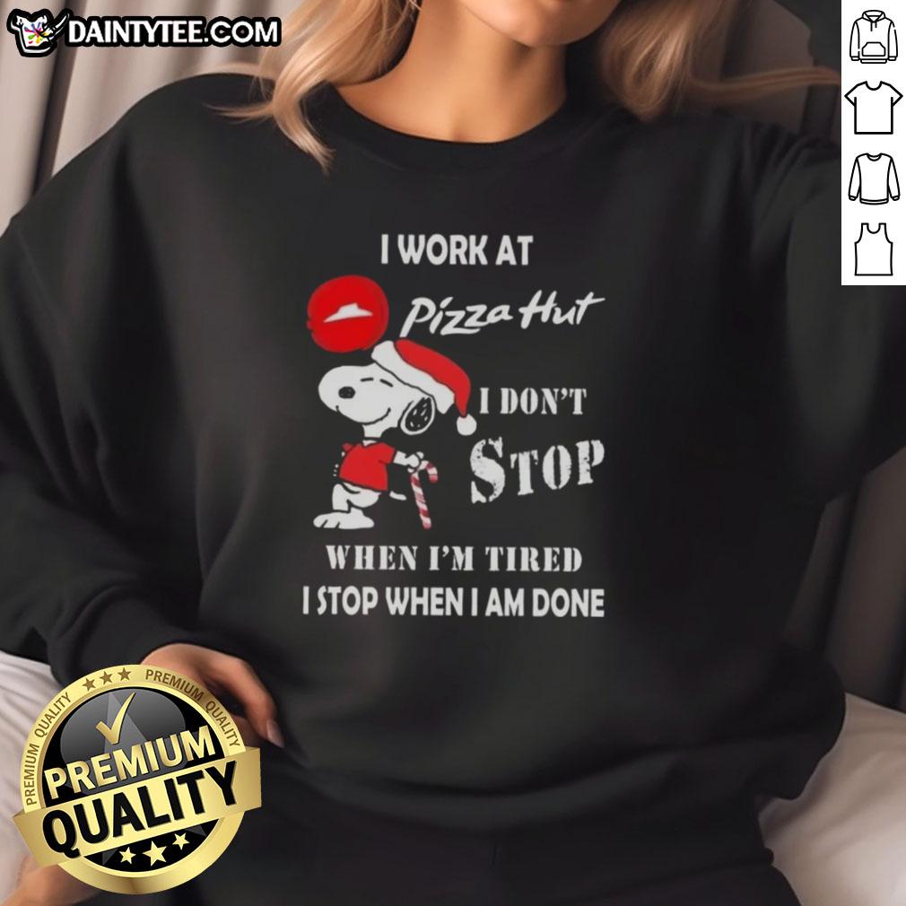 Alt Text: Funny Snoopy Christmas sweatshirt featuring I work at Pizza Hut, I don't stop when I'm tired, I stop when I'm done.