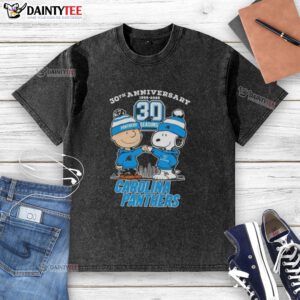 Good Charlie Brown X Snoopy 30th Anniversary T-Shirt featuring Carolina Panthers skyline design, perfect for fans.