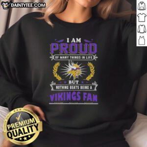 Alt Text: Cozy sweatshirt with 'Good I Am Proud Of Many Things But Nothing Beats Being A Minnesota Vikings Fan' design.