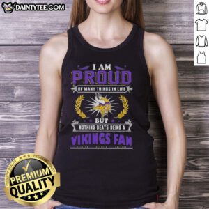 Alt Text: Minnesota Vikings fan wearing a tank top that says 'I Am Proud of Many Things, But Nothing Beats Being a Vikings Fan.'