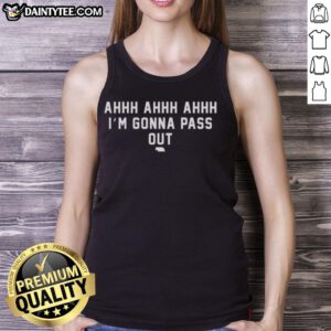 Alt Text: Woman wearing a Good I'm Gonna Pass Out Nebraska Cornhuskers tank top at a football game, showcasing team spirit.