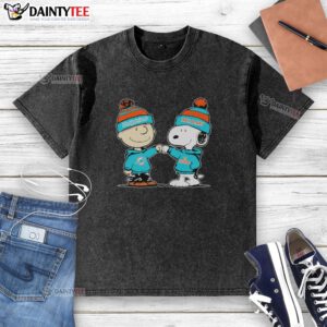 Alt Text: Good Miami Dolphins Snoopy and Charlie Brown Best Friends washed t-shirt featuring iconic cartoon characters.