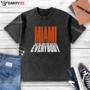 Miami Hurricanes football washed t-shirt featuring the 'Miami Versus Everybody' mascot silhouette design.
