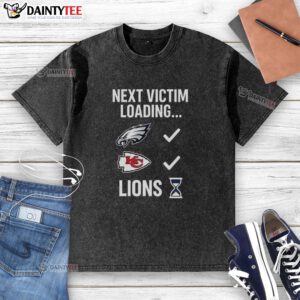 Good Next Victim Loading Lions Hourglass Washed T-Shirt featuring a unique graphic design and soft fabric for casual style.