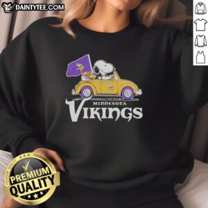 Alt Text: Good Snoopy and Woodstock riding in a Minnesota Vikings football car logo sweatshirt, showcasing team spirit.