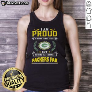 Happy Green Bay Packers fan wearing a proud tank top, celebrating their love for the team and football culture.