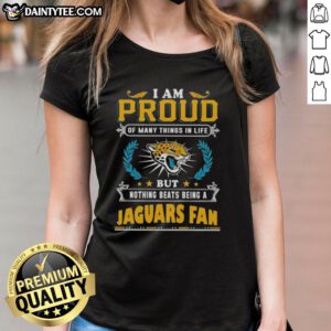 Happy Jacksonville Jaguars fan wearing a ladies tee, showcasing pride and love for the team in vibrant colors.